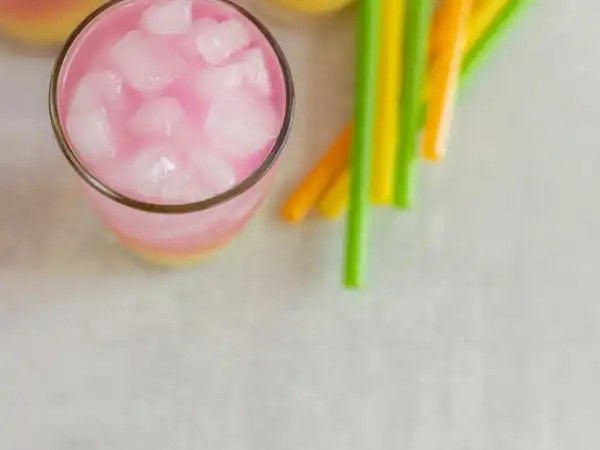 image 15379 - We are sure you're going to think this drink is fin-tastic! Mermaid Water is the best drink you'll find above the sea, featuring a tall glass of icy-cold, sweet berry and glacier freeze sports drinks layered one on top of another, with a bottom layer of tropical pineapple juice. From the bottom to the top of your glass, this drink will have your tastebuds fluttering with glee from under the sea! What's it called again? Mermaid Water! Don't be such a guppy and pour yourself a glass!