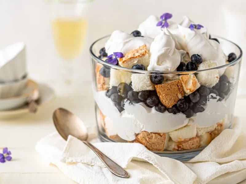 image 15552 - It's no small trifle to fall in love with this Blueberry Trifle! Layers of light whipped cream and bright blueberries sandwiched with layers of buttery, fluffy, tender angel food cake, so every bite of Blueberry Trifle is ethereally light and just the right amount of sweet! It is, however, such a trifle to make the Blueberry Trifle... only 10 minutes and with basically no effort! You can have the most refreshing summertime dessert literally any time!