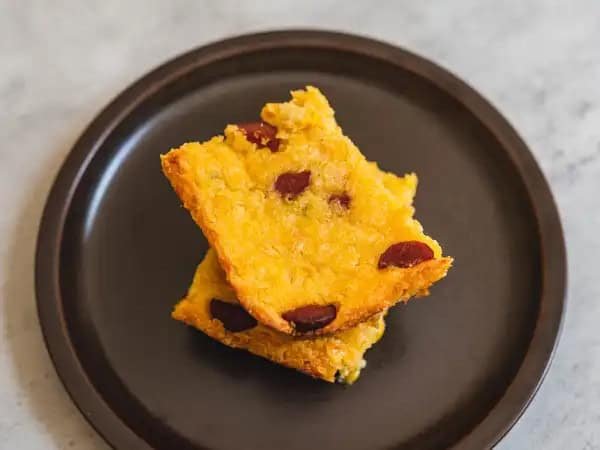 image 8517 - There’s a reason this dish wouldn’t be out of place at the local carnival: it’s basically a corn dog in casserole form! Fluffy, sweet and savory cornbread is loaded with cheese and bites of savory, wonderfully meaty hot dogs! It doesn’t take a rocket scientist to see how delicious that would be! No carnival games needed to win this Fair Favorite Bake; all you need is an oven and a touch of whimsy!