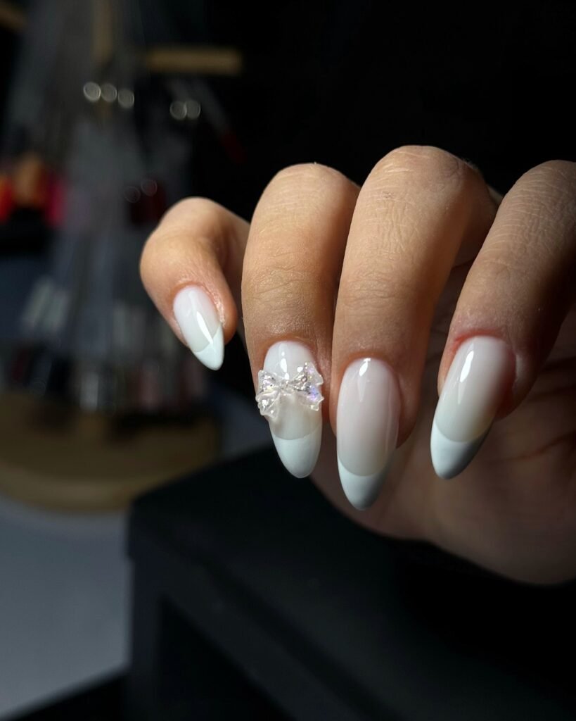 Elegant milky French nails with soft creamy tips, perfect for a timeless and sophisticated look.