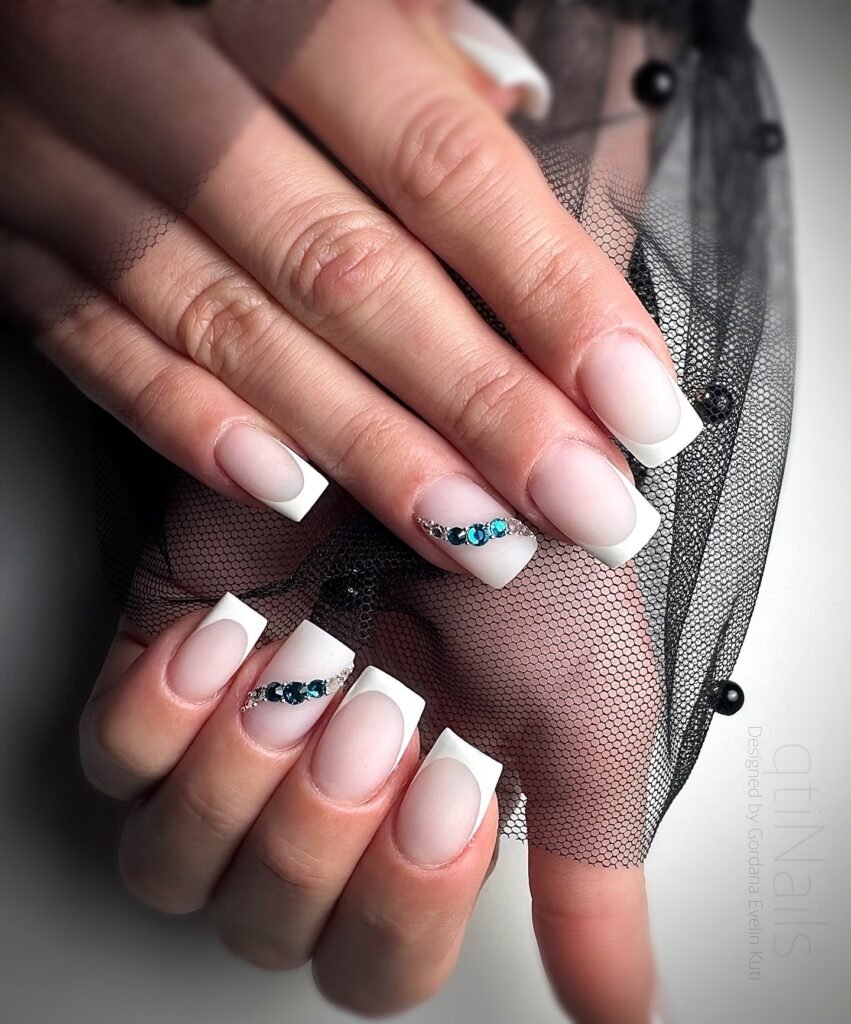 Elegant milky French nails with soft creamy tips, perfect for a timeless and sophisticated look.