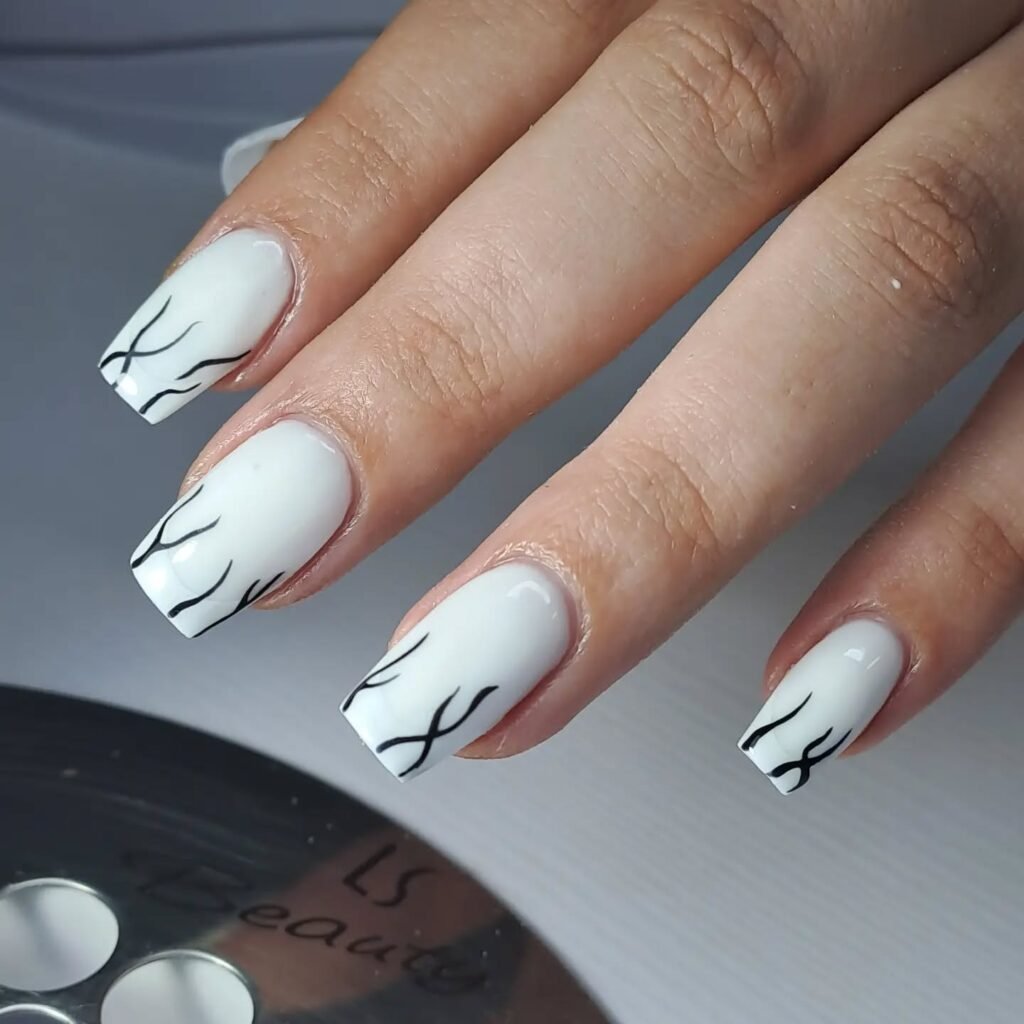 Elegant milky French nails with soft creamy tips, perfect for a timeless and sophisticated look.