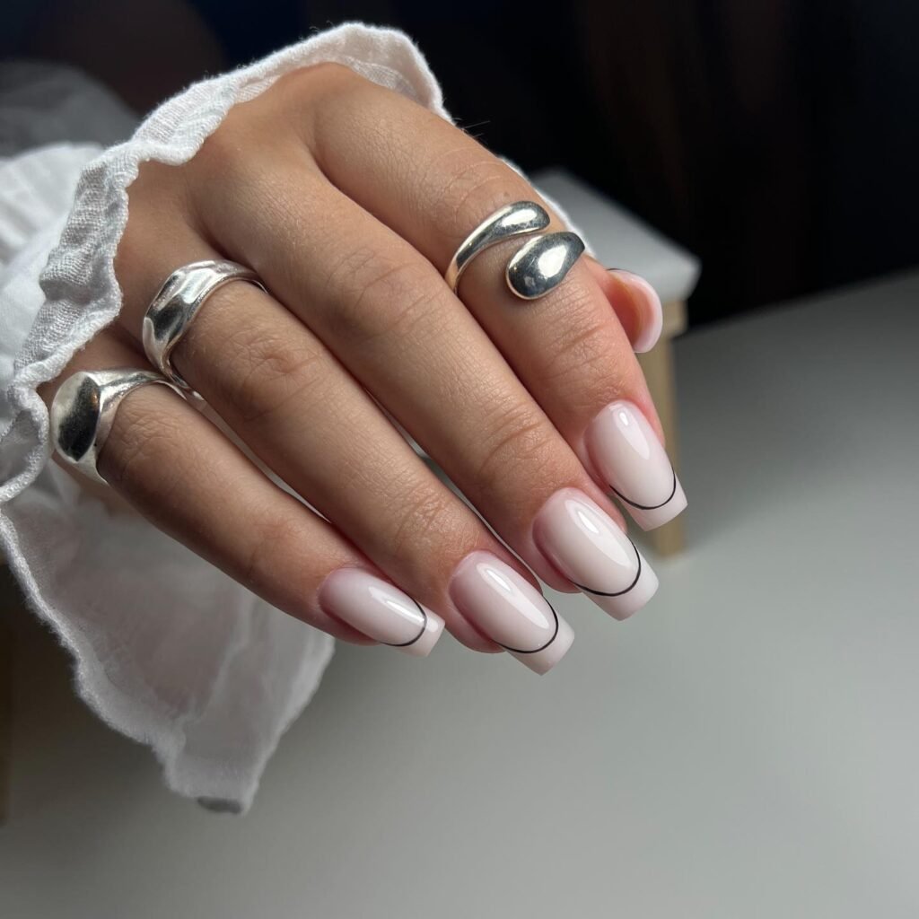 Elegant milky French nails with soft creamy tips, perfect for a timeless and sophisticated look.