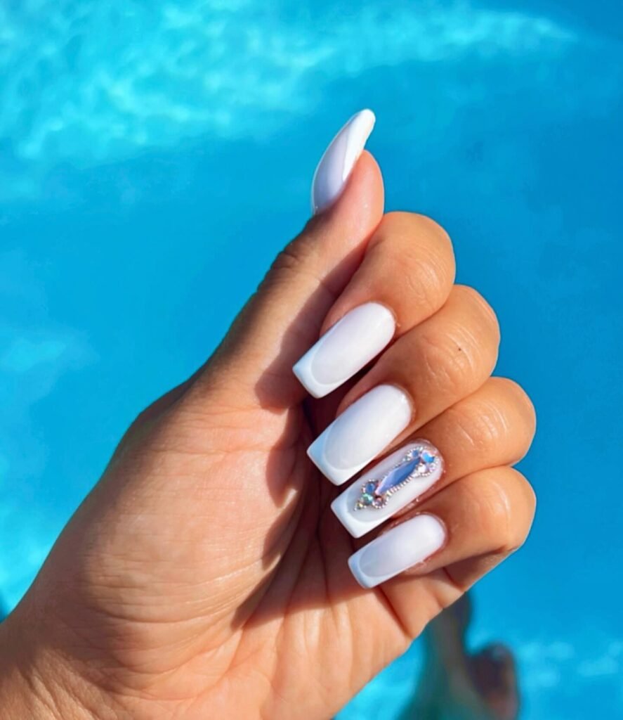 Elegant milky French nails with soft creamy tips, perfect for a timeless and sophisticated look.