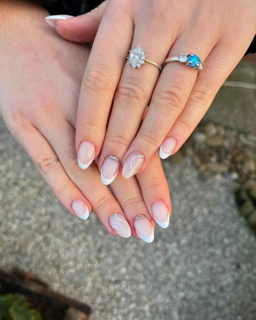 Elegant milky French nails with soft creamy tips, perfect for a timeless and sophisticated look.