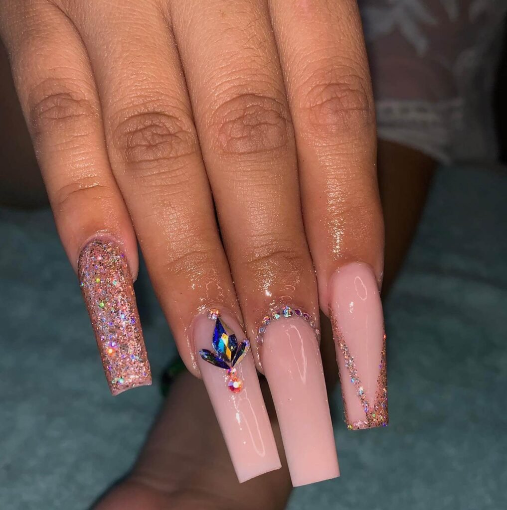 rose gold nails 12 - Rose gold nails are the epitome of elegance and versatility, offering a perfect blend of femininity and sophistication. This stunning nail trend has taken the beauty world by storm, combining soft pink hues with a metallic gold shimmer to create a look that suits every occasion.