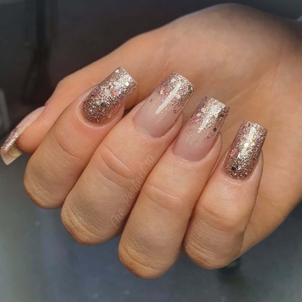 rose gold nails 14 - Rose gold nails are the epitome of elegance and versatility, offering a perfect blend of femininity and sophistication. This stunning nail trend has taken the beauty world by storm, combining soft pink hues with a metallic gold shimmer to create a look that suits every occasion.
