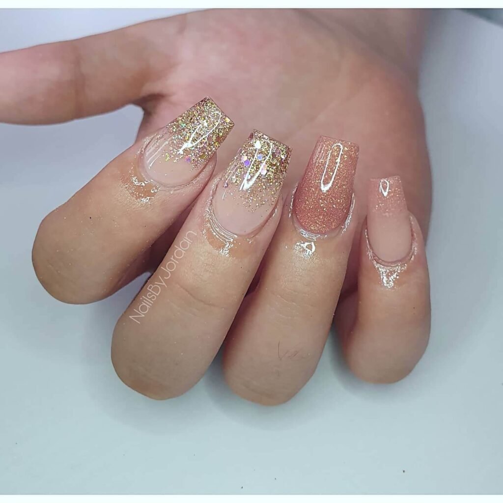 rose gold nails 15 - Rose gold nails are the epitome of elegance and versatility, offering a perfect blend of femininity and sophistication. This stunning nail trend has taken the beauty world by storm, combining soft pink hues with a metallic gold shimmer to create a look that suits every occasion.