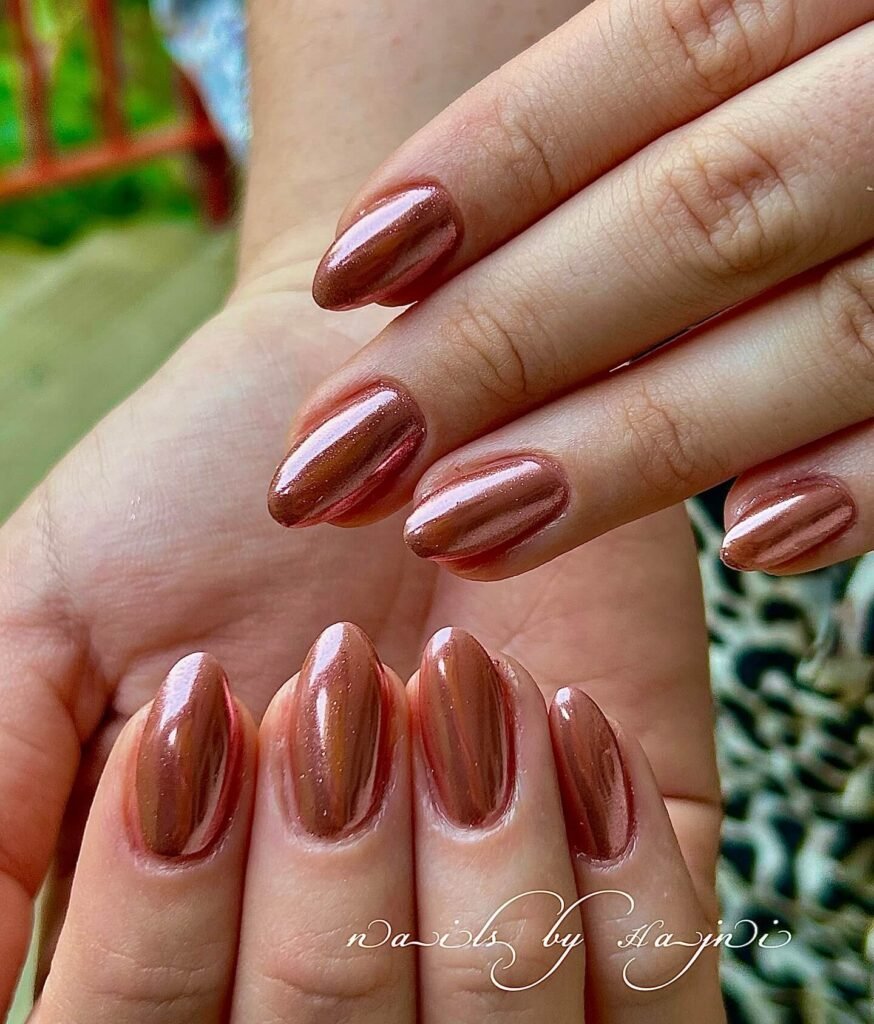 rose gold nails 20 - Rose gold nails are the epitome of elegance and versatility, offering a perfect blend of femininity and sophistication. This stunning nail trend has taken the beauty world by storm, combining soft pink hues with a metallic gold shimmer to create a look that suits every occasion.