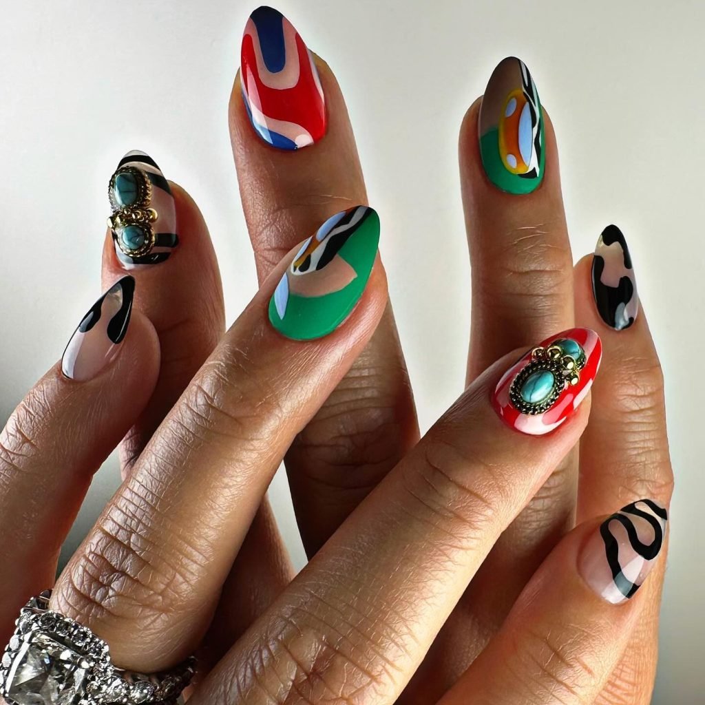 02 Short Maximalist Nails - Short maximalist nail designs prove that bold, extravagant nail art isn't just for long nails. Even with a shorter length, you can rock short maximalist nail designs packed with vibrant colors, intricate patterns, and eye-catching embellishments.