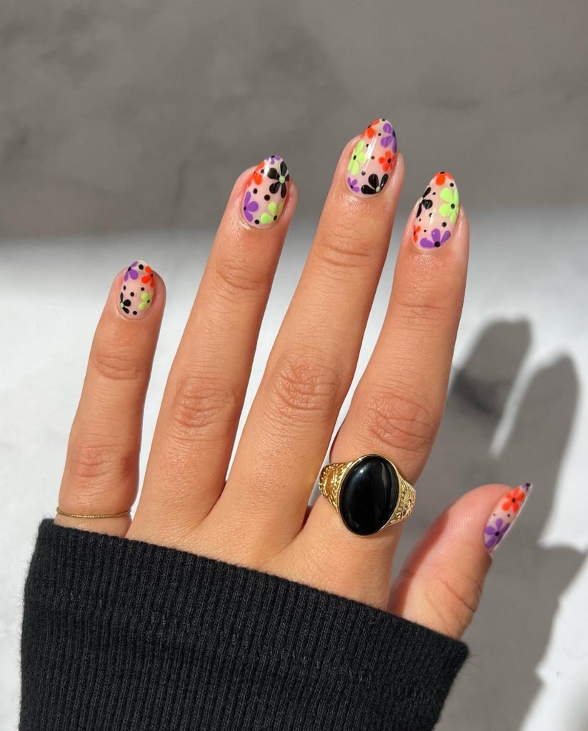 06 Short Maximalist Nails - Short maximalist nail designs prove that bold, extravagant nail art isn't just for long nails. Even with a shorter length, you can rock short maximalist nail designs packed with vibrant colors, intricate patterns, and eye-catching embellishments.