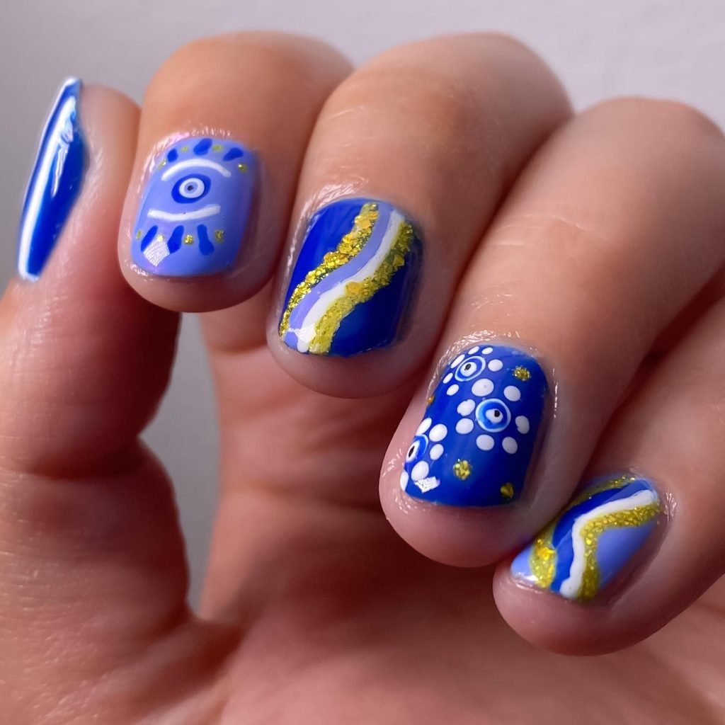 09 Short Maximalist Nails - Short maximalist nail designs prove that bold, extravagant nail art isn't just for long nails. Even with a shorter length, you can rock short maximalist nail designs packed with vibrant colors, intricate patterns, and eye-catching embellishments.