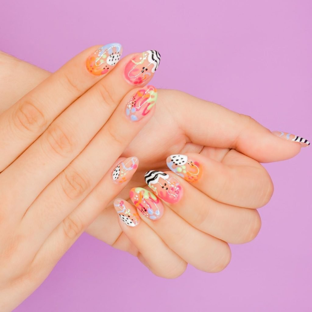 15 Short Maximalist Nails - Short maximalist nail designs prove that bold, extravagant nail art isn't just for long nails. Even with a shorter length, you can rock short maximalist nail designs packed with vibrant colors, intricate patterns, and eye-catching embellishments.
