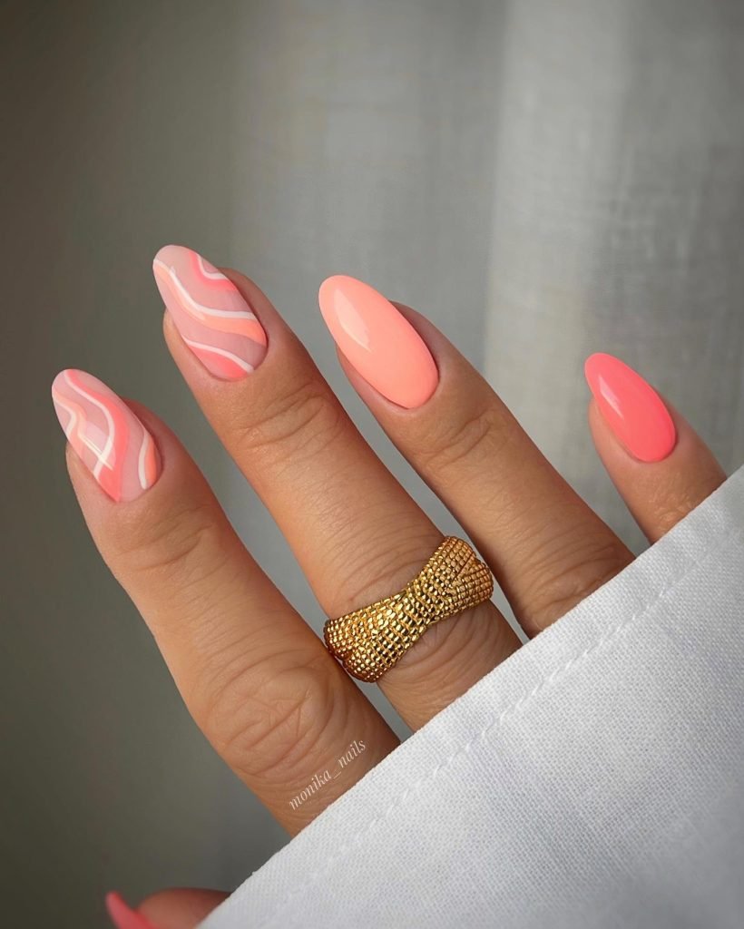 00003 Peach Nails With Designs - Soft, elegant, and effortlessly chic, peach nails with designs are taking over the nail scene. Whether you love delicate floral patterns, abstract swirls, or classy French tips, peach nails with designs add a touch of sophistication to any manicure. I remember scrolling through nail ideas for my last salon visit and stumbling upon the perfect peach nails with designs—a mix of soft ombré and subtle gold accents.