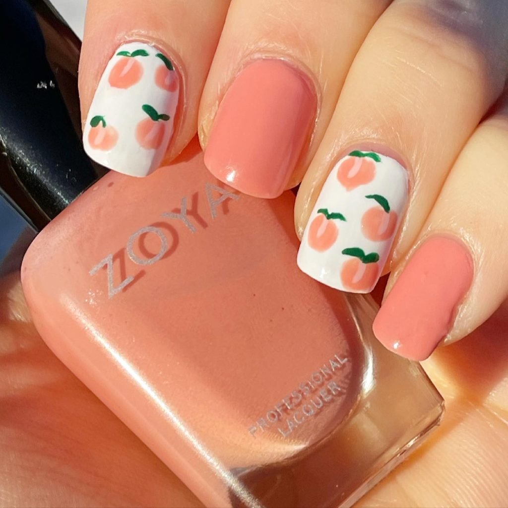 00008 Peach Nails With Designs - Soft, elegant, and effortlessly chic, peach nails with designs are taking over the nail scene. Whether you love delicate floral patterns, abstract swirls, or classy French tips, peach nails with designs add a touch of sophistication to any manicure. I remember scrolling through nail ideas for my last salon visit and stumbling upon the perfect peach nails with designs—a mix of soft ombré and subtle gold accents.