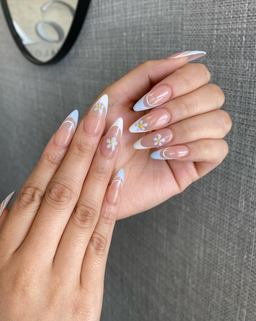 00005 French nails with flowers 2 - Ever since I was a teen experimenting with nail art, French Nails With Flower Design has been my go-to style for adding a touch of elegance and charm. There’s something timeless about French Nails With Flower Design, blending the classic white tips with delicate floral patterns that make my hands feel instantly graceful.