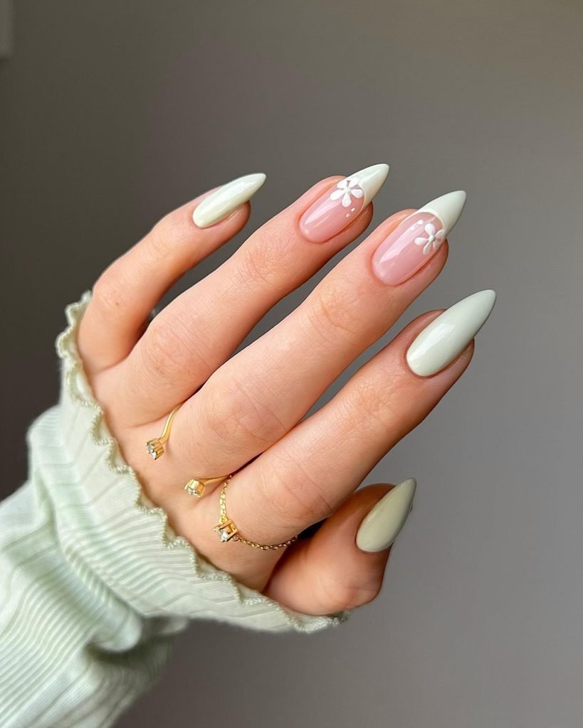 00006 French Nails with Flowers - Ever since I was a teen experimenting with nail art, French Nails With Flower Design has been my go-to style for adding a touch of elegance and charm. There’s something timeless about French Nails With Flower Design, blending the classic white tips with delicate floral patterns that make my hands feel instantly graceful.