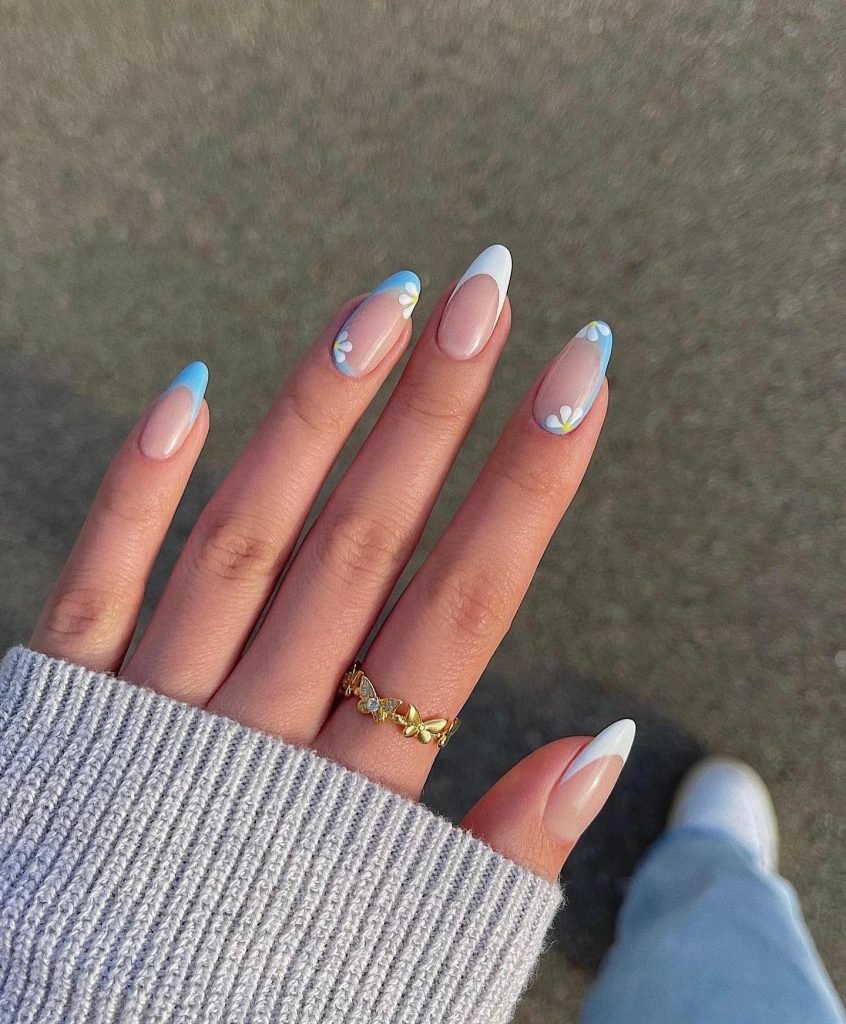 00009 French Nails with Flowers - Ever since I was a teen experimenting with nail art, French Nails With Flower Design has been my go-to style for adding a touch of elegance and charm. There’s something timeless about French Nails With Flower Design, blending the classic white tips with delicate floral patterns that make my hands feel instantly graceful.