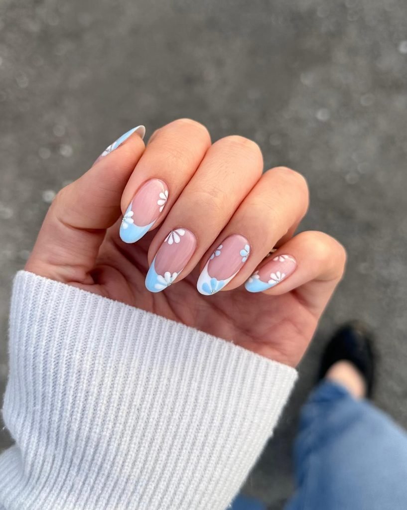 00011 French nails with flowers 2 - Ever since I was a teen experimenting with nail art, French Nails With Flower Design has been my go-to style for adding a touch of elegance and charm. There’s something timeless about French Nails With Flower Design, blending the classic white tips with delicate floral patterns that make my hands feel instantly graceful.