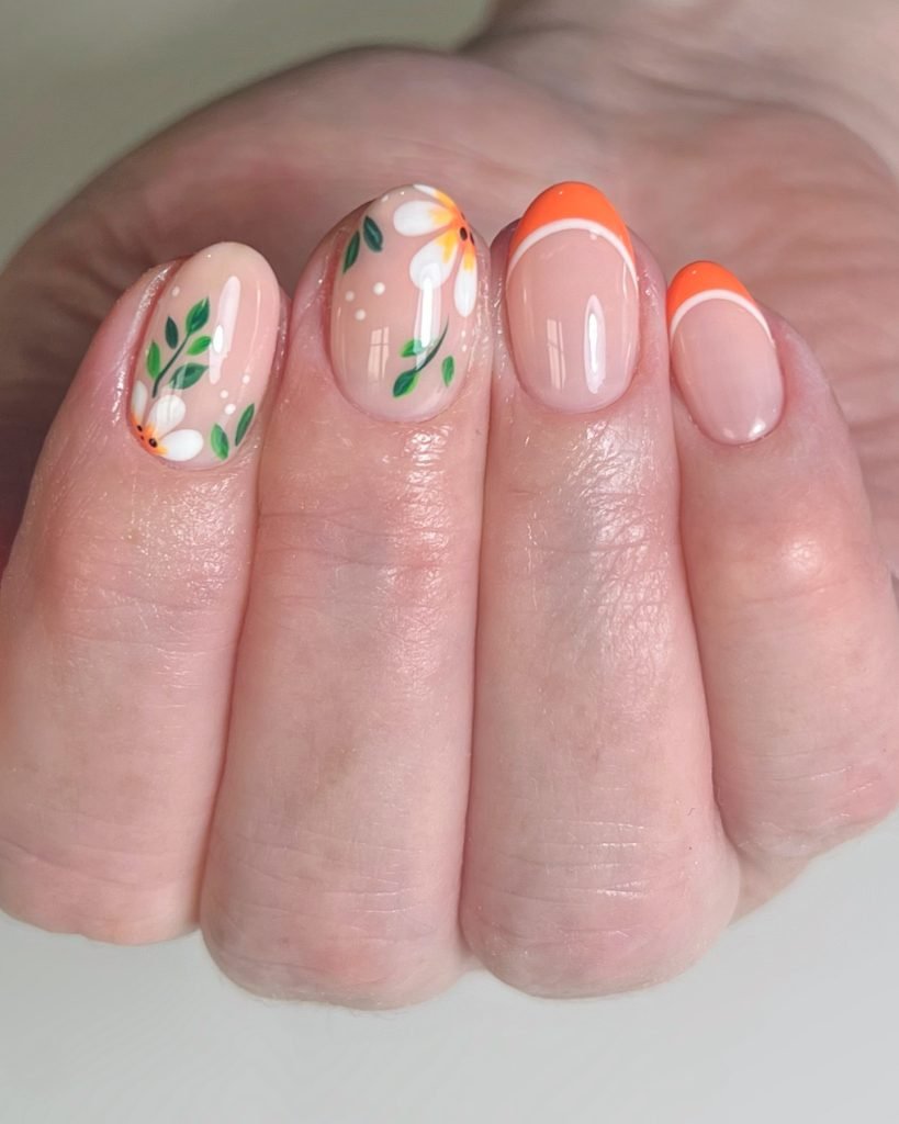00015 French nails with flowers 2 - Ever since I was a teen experimenting with nail art, French Nails With Flower Design has been my go-to style for adding a touch of elegance and charm. There’s something timeless about French Nails With Flower Design, blending the classic white tips with delicate floral patterns that make my hands feel instantly graceful.