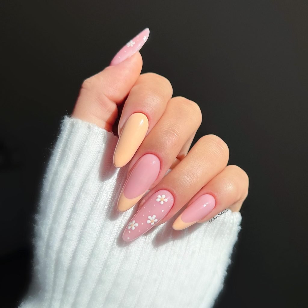 00016 French nails with flowers 2 - Ever since I was a teen experimenting with nail art, French Nails With Flower Design has been my go-to style for adding a touch of elegance and charm. There’s something timeless about French Nails With Flower Design, blending the classic white tips with delicate floral patterns that make my hands feel instantly graceful.