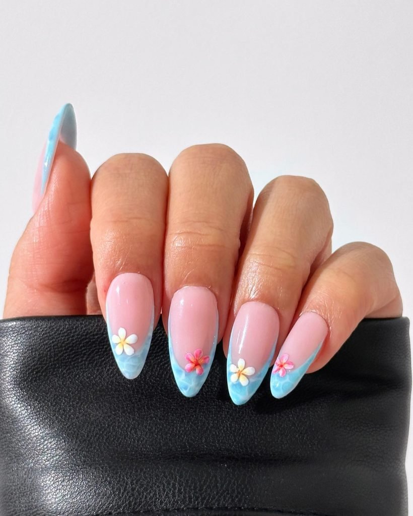 00018 French Nails with Flowers - Ever since I was a teen experimenting with nail art, French Nails With Flower Design has been my go-to style for adding a touch of elegance and charm. There’s something timeless about French Nails With Flower Design, blending the classic white tips with delicate floral patterns that make my hands feel instantly graceful.