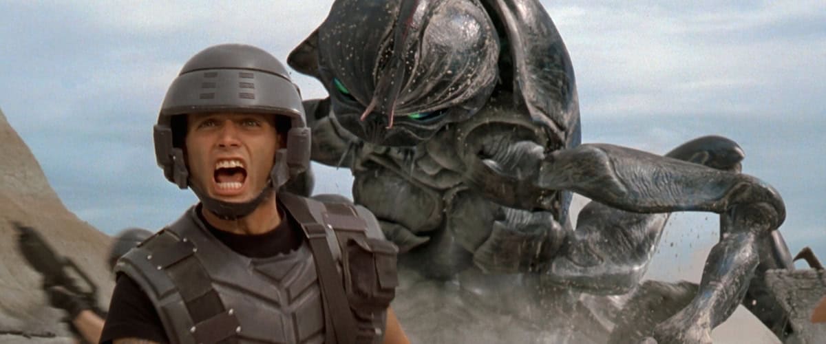 Starship Troopers image - Alien invasion films have enthralled audiences since the early days of cinema. The concept of extraterrestrial beings coming to Earth taps into our fears and curiosities about the unknown. This list highlights 15 of the most iconic and acclaimed alien movies that have left their mark on pop culture.