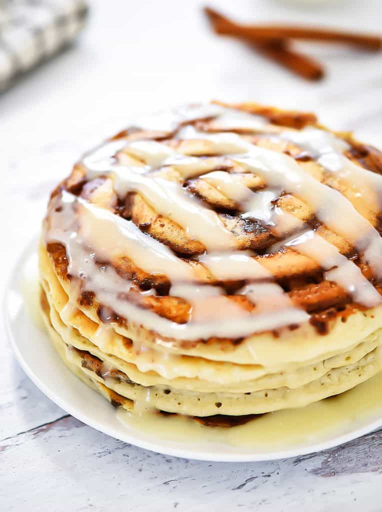 Cinnamon Roll Pancakes600 764x1024 1 - As the crisp autumn air begins to settle in and the leaves turn vibrant shades of red, orange, and yellow, there's nothing quite like starting the day with a warm, hearty breakfast that captures the essence of fall. The comforting aroma of spices like cinnamon, nutmeg, and cloves fill the kitchen, evoking a sense of nostalgia and coziness.