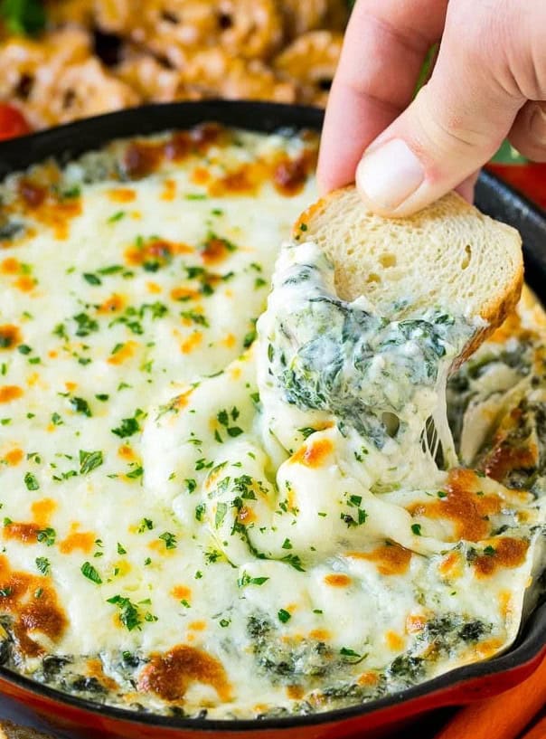 Hot Spinach Dip - Explore our vibrant Easter recipe collection for your holiday gatherings! Discover an array of dishes ranging from classic Easter dinner options showcasing ham and lamb, to inventive side dishes and party fare suggestions, ensuring there's something for every taste bud.