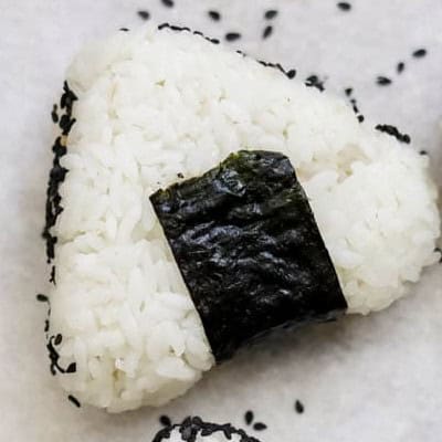 Spicy Tuna Onigiri - Enjoy these simple picnic snacks. Whether you're craving savory picnic finger foods or delightful sweet picnic treats, explore delicious picnic recipes to enhance your outdoor dining. Find inspiration and craft unforgettable memories with family and friends surrounded by the beauty of nature.