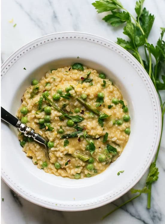 Spring Pea and Asparagus Risotto - Explore our vibrant Easter recipe collection for your holiday gatherings! Discover an array of dishes ranging from classic Easter dinner options showcasing ham and lamb, to inventive side dishes and party fare suggestions, ensuring there's something for every taste bud.