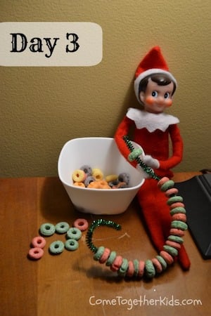 Elf making a Fruit Loop Garland