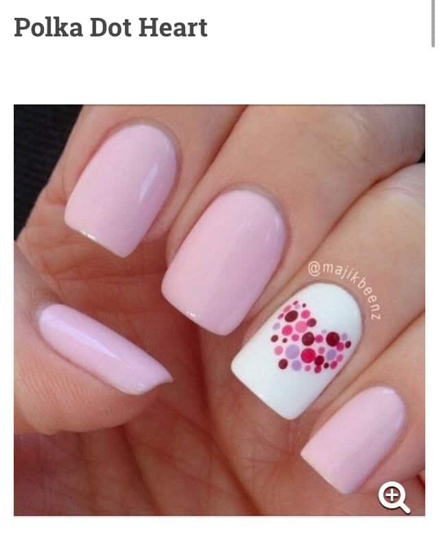 2d13519f 2ff2 4f7f 9376 999dc1b38c45 - Valentine's Day manicures infuse a hint of romance into your look, presenting a plethora of charming styles ranging from adorable pink manicures to sophisticated red Valentine's Day designs. Whether you prefer a minimalist approach with short Valentine's manicures or crave something more intricate such as acrylic Valentine's Day nail art, this article will lead you through a diverse range of nail concepts to stylishly celebrate love.