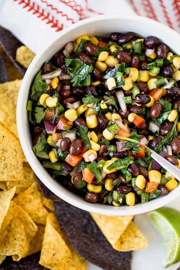 BLACK BEAN SALSA 3 754 - Searching for speedy and hassle-free summer appetizers for your forthcoming BBQ gathering? You're in luck! In this article, I'll unveil a selection of my preferred summer appetizers tailored for a large group. Whether your cravings lean towards savory or sweet, I've got you sorted. Prepare to embark on a culinary adventure!