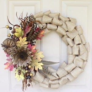 burlap wreath with fall florals on the side