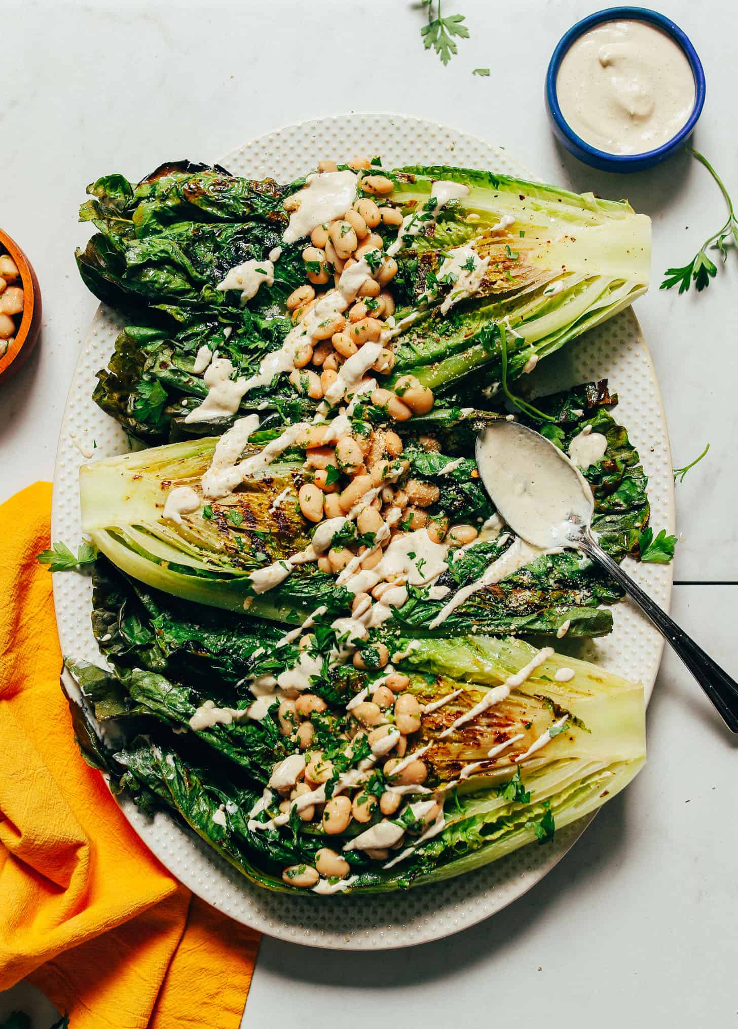 DELICIOUS Grilled Romaine Salad with Lemon Herbed Beans and Quick Caesar Dressing. 30 minutes BIG flavor so wholesome glutenfree plantbased romaine salad minimalistbaker 11 - Searching for speedy and hassle-free summer appetizers for your forthcoming BBQ gathering? You're in luck! In this article, I'll unveil a selection of my preferred summer appetizers tailored for a large group. Whether your cravings lean towards savory or sweet, I've got you sorted. Prepare to embark on a culinary adventure!