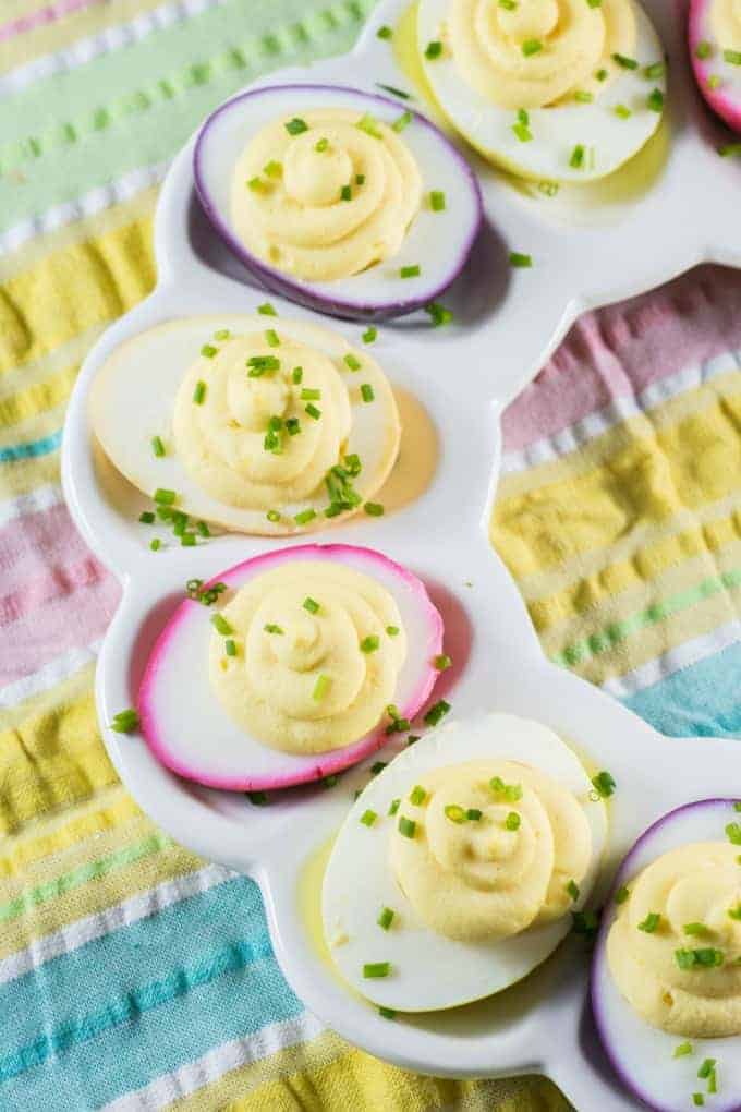 Rainbow Easter Deviled Eggs 4 - Explore the delight of Easter culinary inspirations with our collection of effortless Easter recipes designed for a large gathering! Embrace a spectrum of options ranging from classic Easter dinner dishes to inventive vegan Easter fare and gluten-free alternatives, ensuring inclusivity for all tastes.