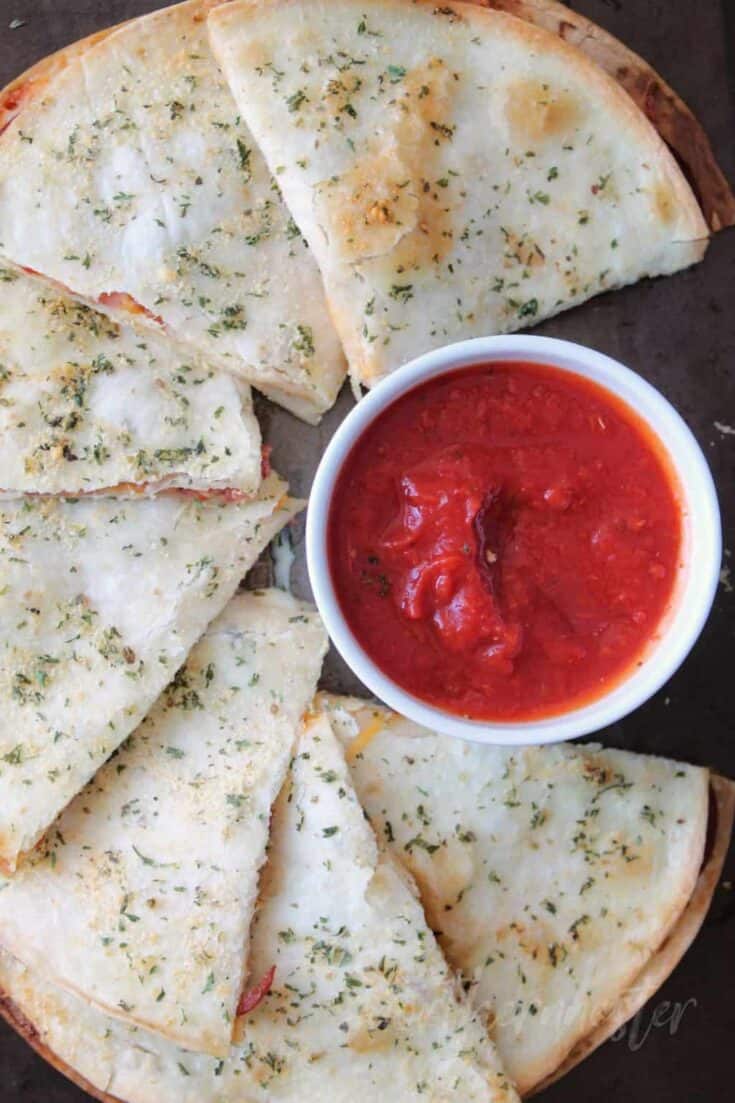 pizza quesadillas thm scaled 1 - Explore a plethora of family dinner ideas that won't break the bank! Delve into speedy weeknight meals, ideal for families with jam-packed schedules. We have a wide array of options, from effortless one-pot dishes to recipes tailored to please the kids.