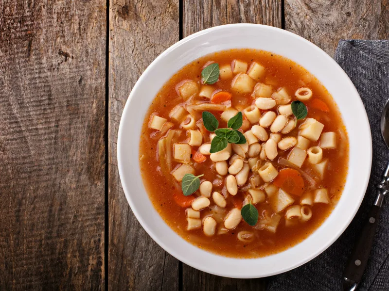 1 46 - The history of Minestrone Soup reaches all the way back to the early Roman Republic and is one of the most flexible recipes in history; it can be made with just about anything that your heart desires. This Slow Cooker Minestrone Soup recipe actually has everything your heart might desire — savory broth, sharp parmesan, and refreshing vegetables. Filled with tender pasta and nutty white beans, Slow Cooker Minestrone soup has a delectable range of textures and tastes in every sip. This soup is low effort and delightful for chilly evenings.