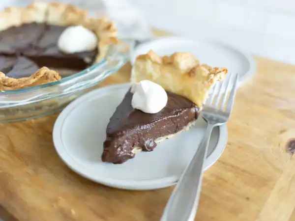 2 105 - Want a dessert fit for royalty? Million Dollar Chocolate Pie is like money in the bank when it comes to rich, decadent taste! An extravagant, creamy chocolate filling sits on a throne of flaky pie crust for a simple yet elegant dividend of exquisite, chocolatey superiority. Crowned with rich whipped cream, this Million Dollar Chocolate Pie takes the cake with its commanding presentation. It's truly priceless!