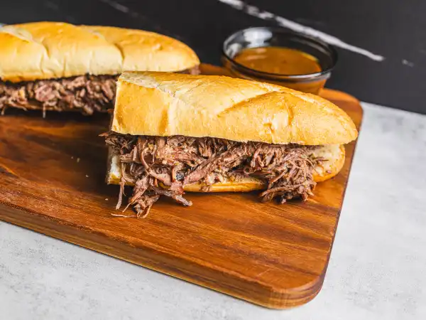 2 24 - If you're craving a classic, these are the most Delicious French Dip Sandwiches! Not only are they loaded with that slightly salty, perfectly tender beef stuffed in a fluffy roll, but they're extremely easy to make. All you have to do is dump all that goodness (minus the bread, of course) in a slow cooker and let it get to work. Ahh, they really are the best, and most Delicious French Dip Sandwiches ever!