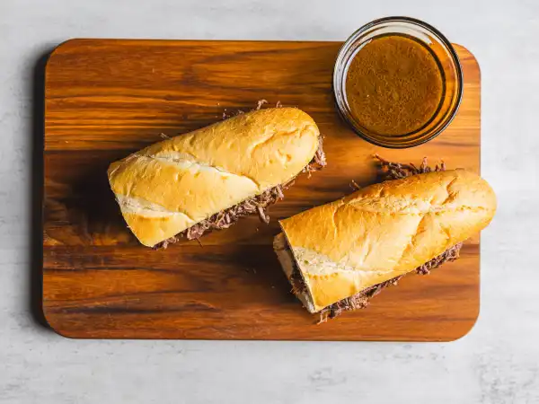 3 23 - If you're craving a classic, these are the most Delicious French Dip Sandwiches! Not only are they loaded with that slightly salty, perfectly tender beef stuffed in a fluffy roll, but they're extremely easy to make. All you have to do is dump all that goodness (minus the bread, of course) in a slow cooker and let it get to work. Ahh, they really are the best, and most Delicious French Dip Sandwiches ever!
