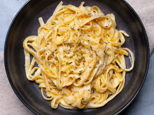 1 16 - When you need to dine in a short amount of time, Quick & Easy Creamy Fettuccine can be your dinnertime genie! Even though it's a mouthful to say, you won't even care what it's titled as you fill your mouth with those yummy fettuccine noodles twirled in a cheesy and (you guessed it) creamy sauce. Tastes like five-star but ready in a jiffy like fast-food, Quick & Easy Creamy Fettuccine really brings mealtime magic!