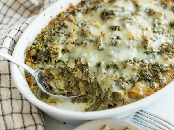 1 32 - Looking to add a new side to your list of supporting dinner actors? Golden Kale Bake has stepped onto the red carpet, and it will certainly become the star of the show. Draped with the golden glow of parmesan cheese, tender kale is dressed and tanned to perfection... making it ready to set a new exciting standard for your dinner scene. Golden Kale Bake is getting rave reviews, and we think you will love it, too. It is a 5-star dish that will have you starry-eyed for more.
