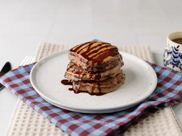 1 7 - When you love chocolate and you also love pancakes, there is only one thing to do! Combine the two and you have Chocoholic Pancakes to the rescue! Fluffy, chocolate-infused pancakes will definitely get you motivated to get up and get going! By discovering Chocoholic Pancakes, you will never go back to those regular, old pancakes. Start your morning off on a glorious note with all the chocolate you love! No intervention needed!