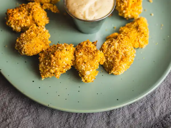 2 18 - Since the once-ninth planet in the solar system didn't get to keep its gig, it had to find a new day job. Kind of vast career change, but it ended up in the food industry which is how Pluto's Popcorn Chicken became such a star dish. Crispy, juicy, and complete with a sweet-and-creamy, homemade dipping sauce, you're definitely going to want to make space for these little balls of deliciousness on your menu. Sometimes you just have to find the place you're meant to be, and we'd say that's the case for ole Pluto's Popcorn Chicken. They're really out of this world!