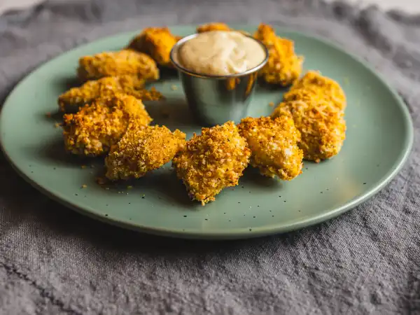 3 5 - Since the once-ninth planet in the solar system didn't get to keep its gig, it had to find a new day job. Kind of vast career change, but it ended up in the food industry which is how Pluto's Popcorn Chicken became such a star dish. Crispy, juicy, and complete with a sweet-and-creamy, homemade dipping sauce, you're definitely going to want to make space for these little balls of deliciousness on your menu. Sometimes you just have to find the place you're meant to be, and we'd say that's the case for ole Pluto's Popcorn Chicken. They're really out of this world!