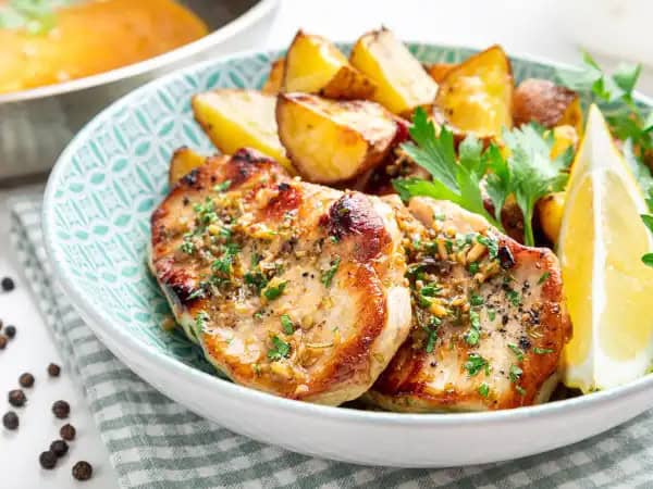 image 10167 - Sometimes simple is just so good! And with Baked Boneless Chops, you would never guess just how easy good food can be to make. Boneless pork chops are browned and then baked in a garlic-rosemary sauce for an extra special touch. Simple, yet elegant, and very delicious, these perfectly seasoned Baked Boneless Chops are the way to go when you want good food fast that tastes nothing like fast food. Take your time and enjoy!