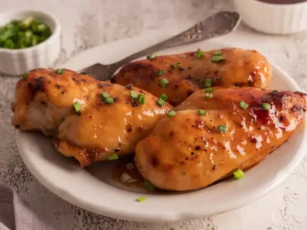image 10929 - Dress your chicken for success! Sweet N' Spicy Chicken Breasts will become a fast favorite, lighting up your dinner runway of chicken dressing options. Step right this way as your plump, juicy chicken breasts get all glammed-up in a sweet and spicy sauce made of brown sugar, hot sauce, and apple cider vinegar with a touch of garlic, before getting baked to golden-brown perfection. These sauntering Sweet N' Spicy Chicken Breasts will be all the rage at your next star-studded event or quiet meal for two. Whatever the case, let your chicken strut its stuff in all your dinner catwalks. It will stun you and leave everyone smiling. Work it!