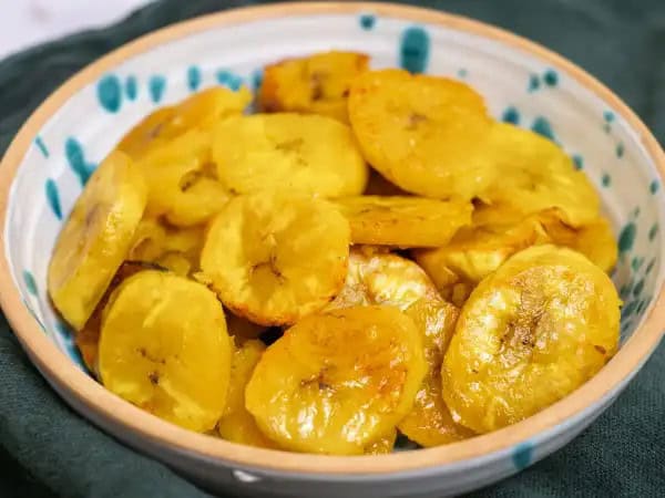 image 11538 - It's your lucky day! You have stumbled upon the best snack ever! These Perfect Baked Plantains are so delicious. They're just the right amount of sweet with the most satisfying amount of salt. The edges bring a tiny bit of crispy crunch, and the insides are amazingly tender. And the best part is they're good for your body... providing you with a yummy, healthy, carb-filled snack with all the good kinds offiber, vitamins, and minerals. Perfect Baked Plantains can't be beat! You're in for a real treat with these little guys!